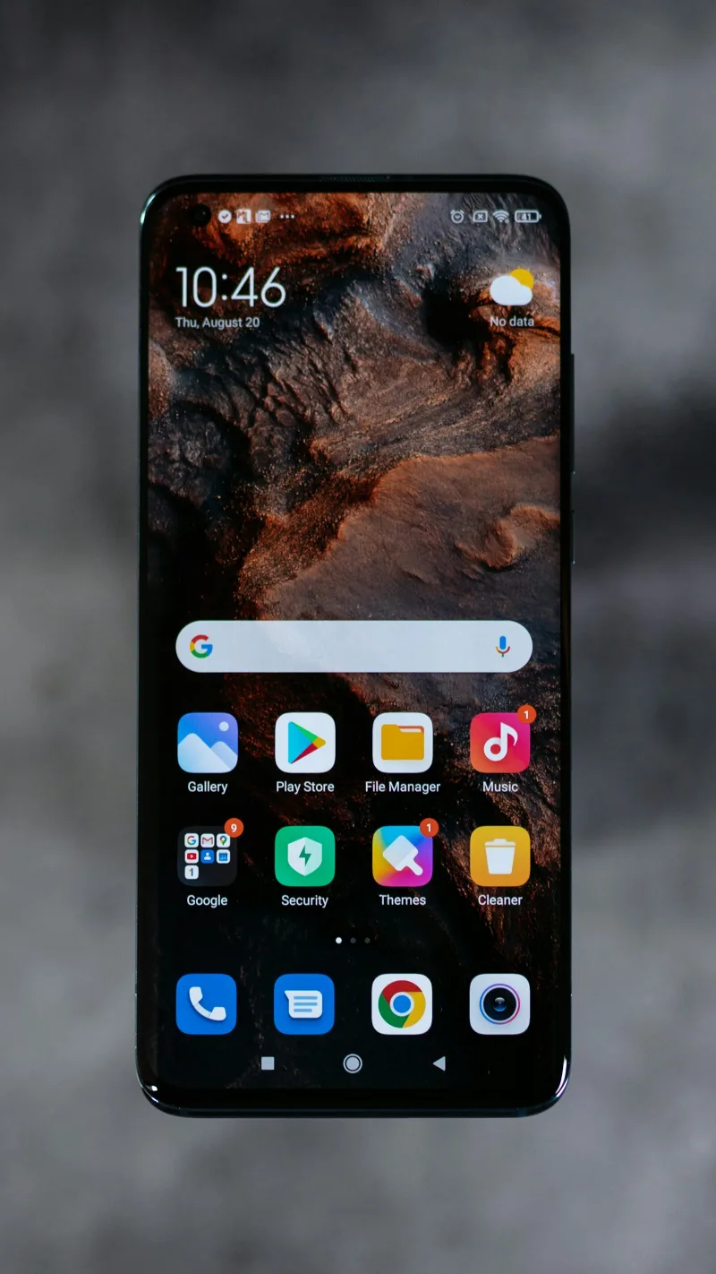Modern flagship smartphone with premium triple camera housing and titanium frame