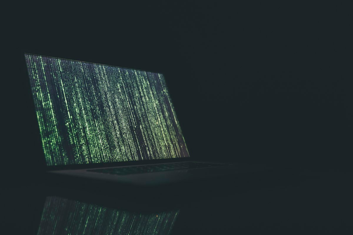 Cybersecurity engineer auditing PHP-FPM security hardening configurations on high-availability server racks